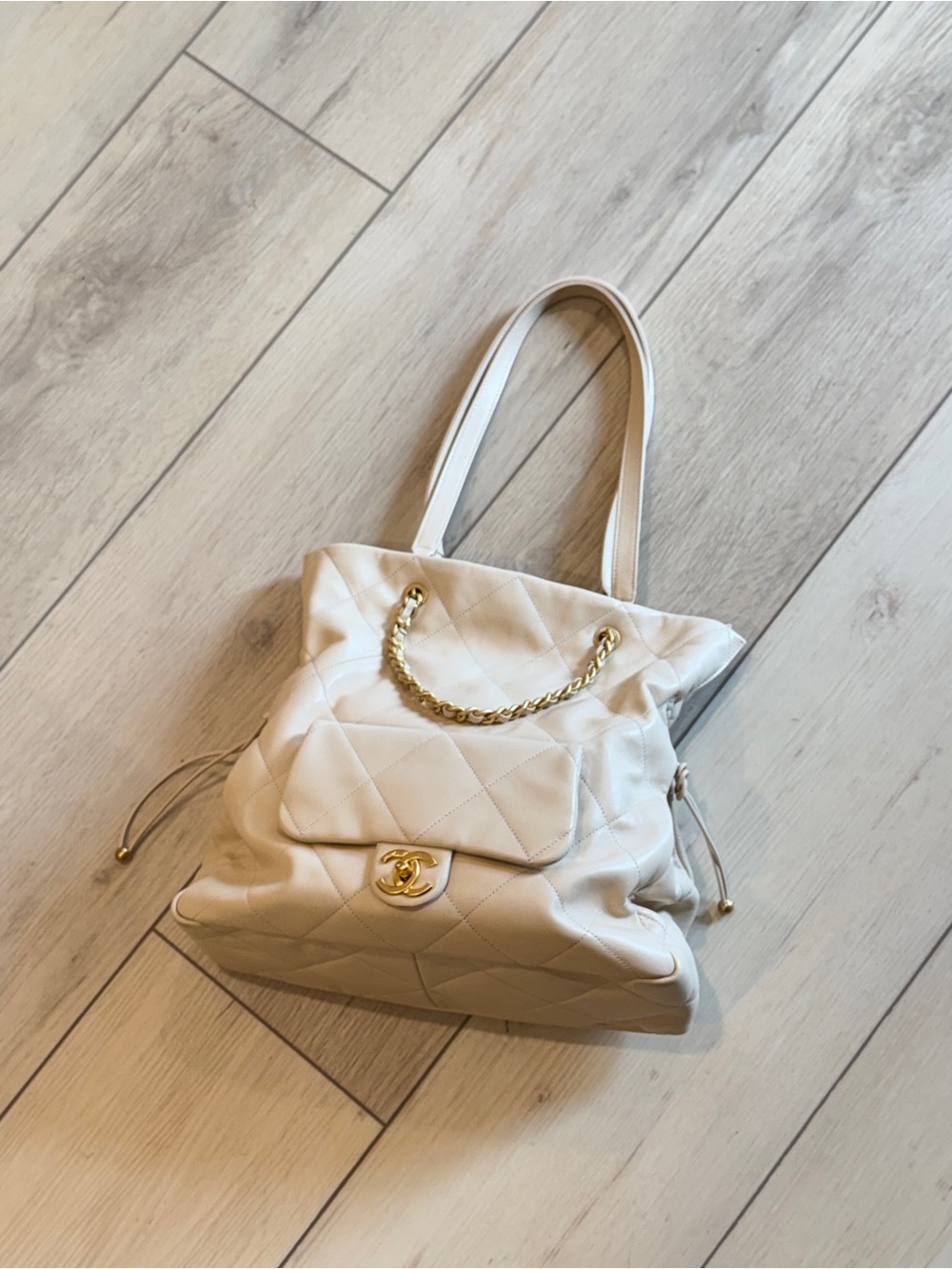 CHANEL Cream Quilted Leather Tote with Gold Chain Detail
